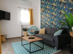 Les toucans sous le clocher. Appartement, terrasse et spa.